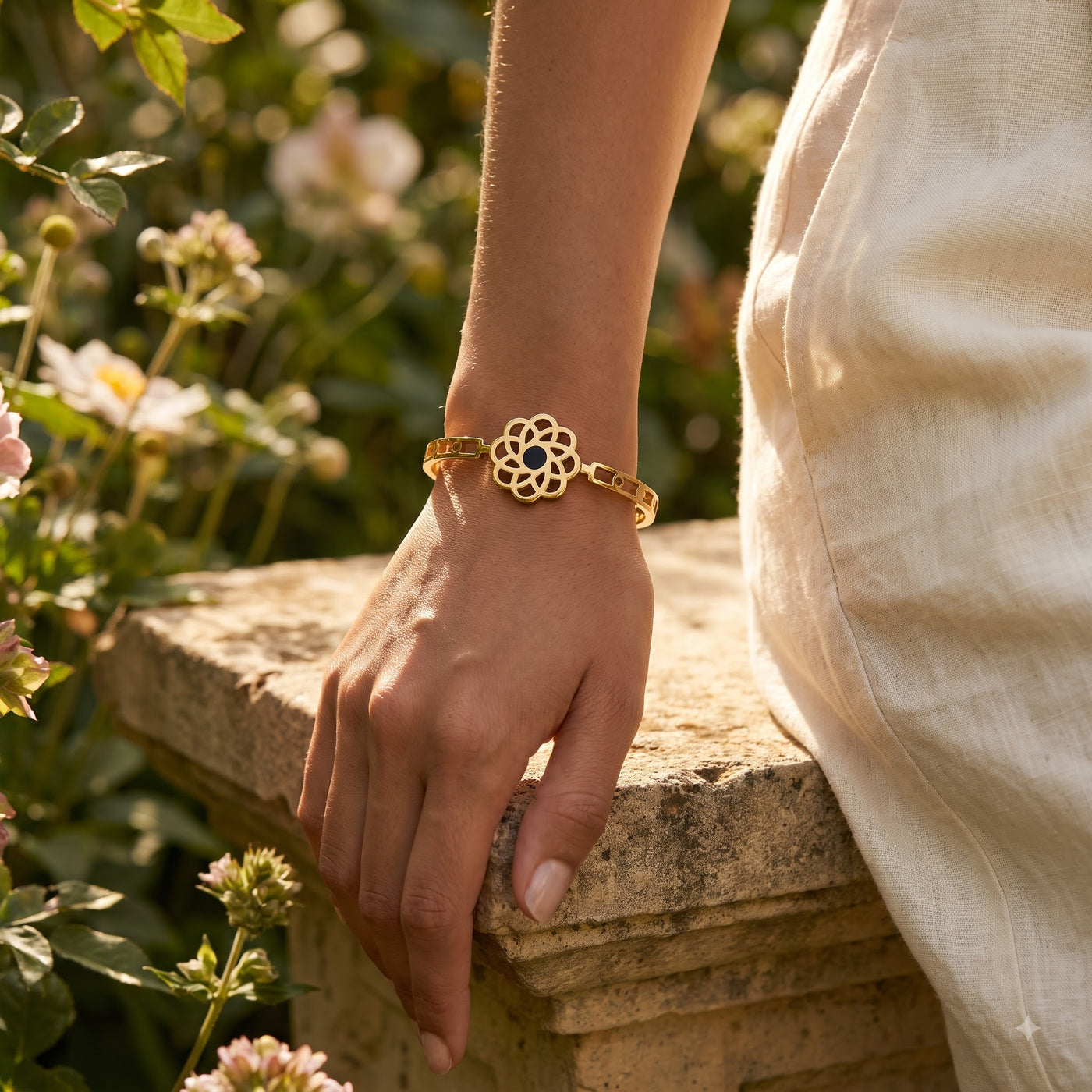Gold Filigree Flower Statement Bracelet with Black Center - Image 2